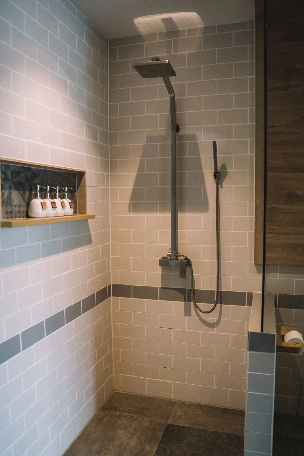 Elegant bathroom interior with a sleek shower and tile design
