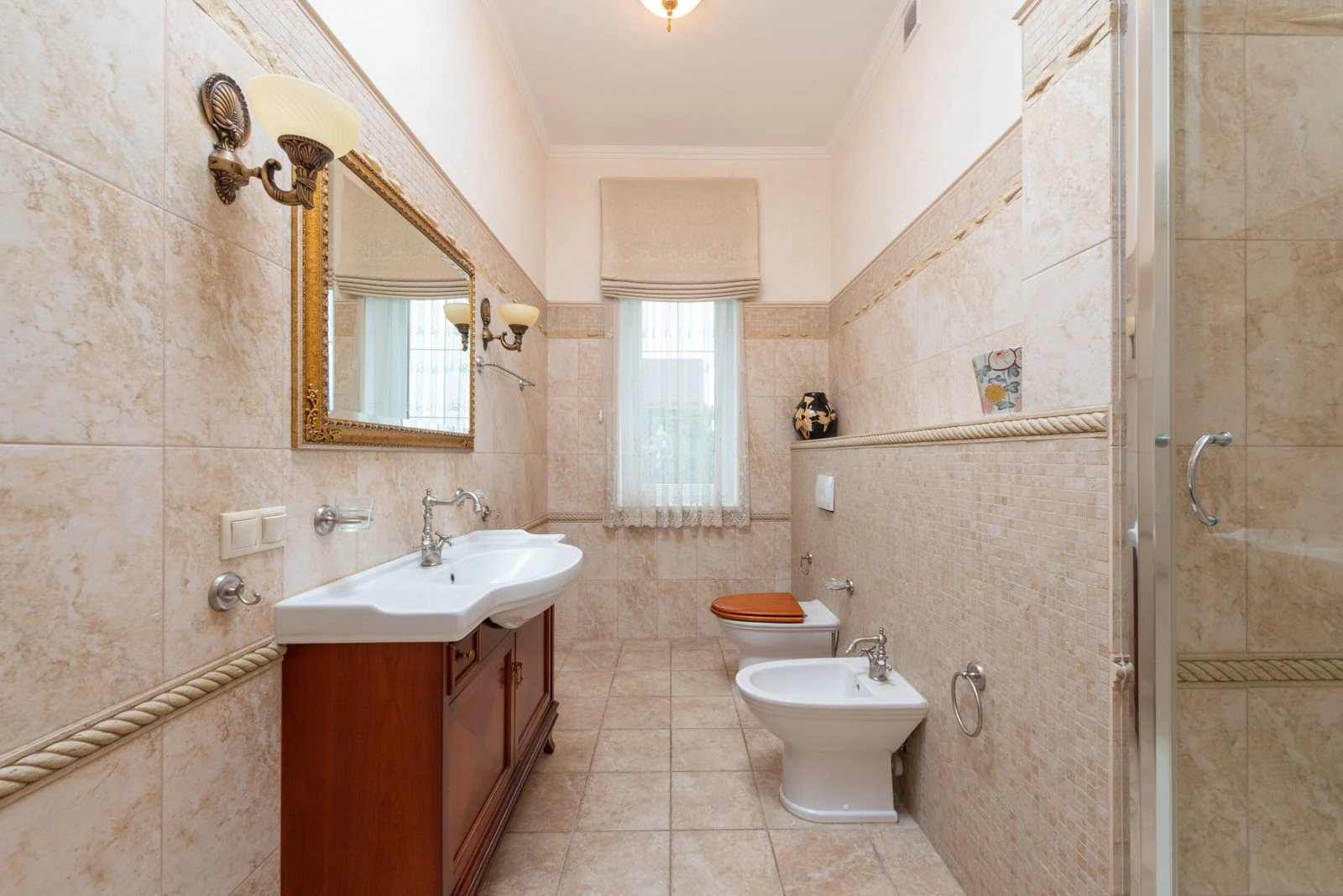 Classic style bathroom with elegant fixtures and neutral tones